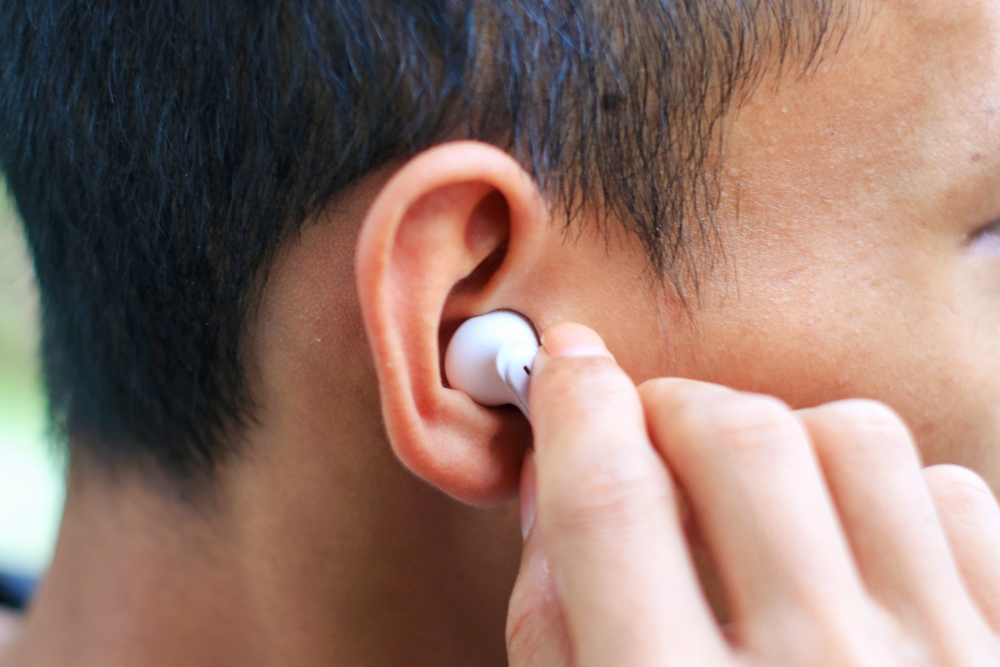 A man with Earbud.